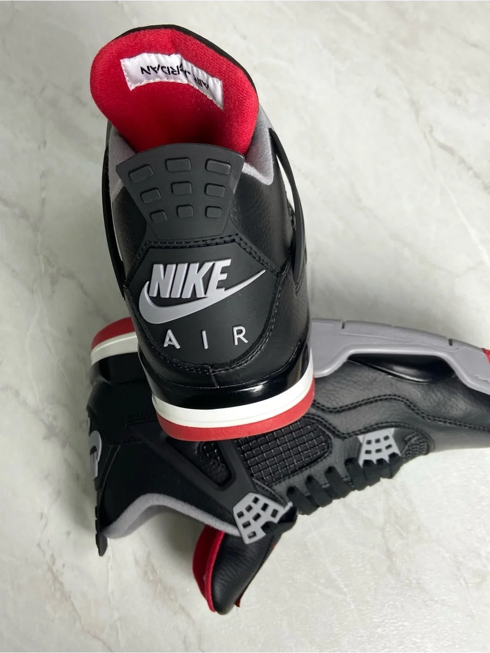 Jordan Black Sneakers with Red and Gray Accents